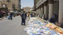من سوق الكتاب في "شارع المتنبّي" وسط بغداد، تموز/ يوليو 2022 (Getty)