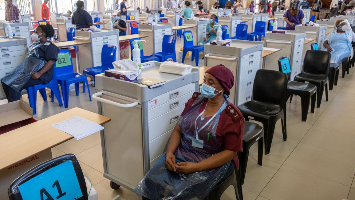 TOPSHOT-SAFRICA-HEALTH-VIRUS-VACCINE TOPSHOT - Health workers wait to administer the Johnson and Johnson vaccine at the Chris Hani Baragwanath Hospital in Soweto on February 17, 2021. (Photo by Emmanuel Croset / AFP) (Photo by EMMANUEL CROSET/AFP via Getty Images)