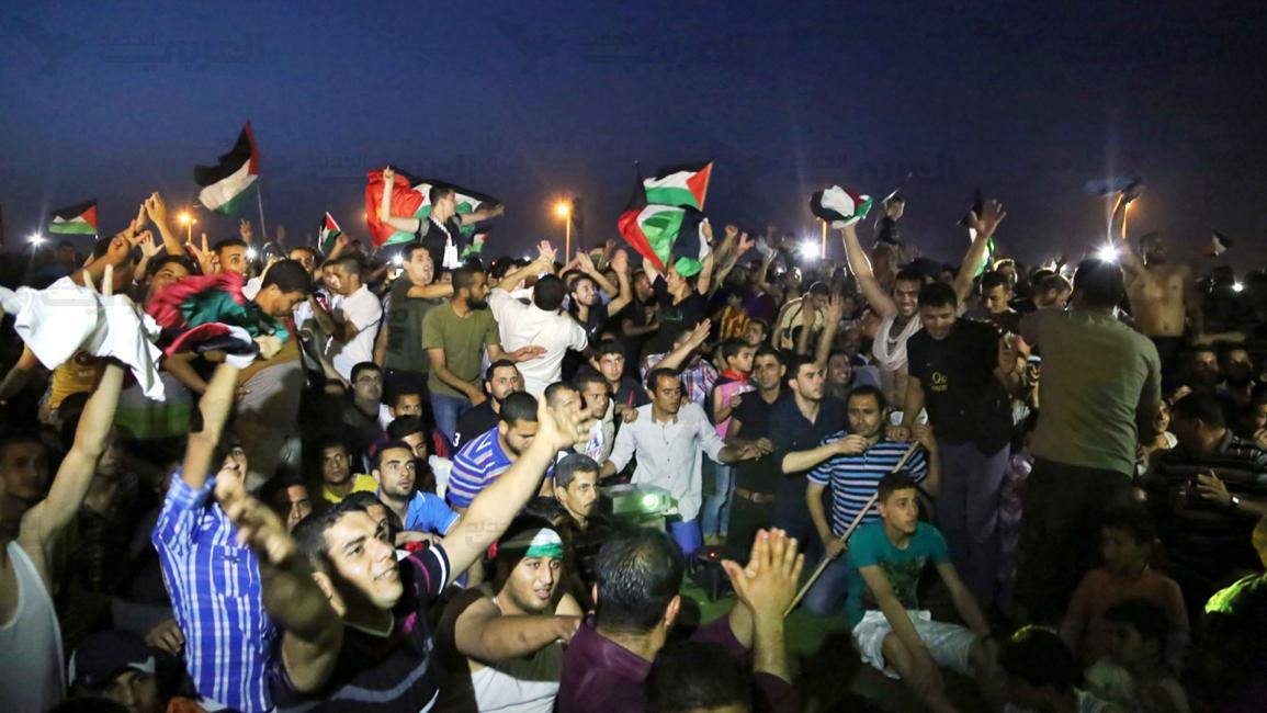 فرحة بغزة بعد فوز المنتخب الوطني على الفلبين