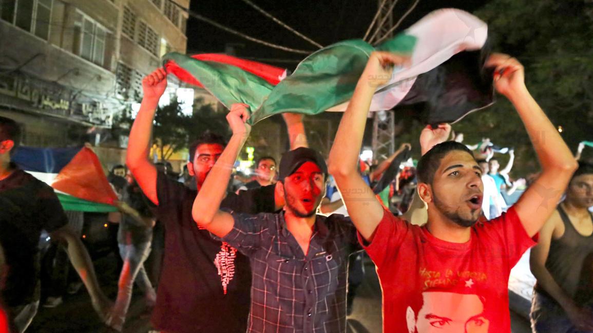 فرحة بغزة بعد فوز المنتخب الوطني على الفلبين