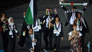 الوفد الفلسطيني في افتتاح الأولمبياد في الاستاد الأولمبي في لندن في 27 يوليو 2012 (فرانس برس)