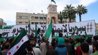 تظاهرة في إدلب ضد بشار الأسد، 13 مايو 2023 (عمر حاج قدور/ فرانس برس)