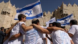 مستوطنون في القدس خلال مسيرة الأعلام، 5 يونيو 2024 (فايز أبو رميلة/فرانس برس)