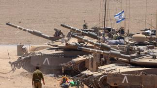 آليات عسكرية إسرائيلية على الحدود مع قطاع غزة، 9 يوليو 2024 (جاك غويز/فرانس برس)