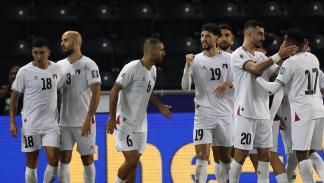 لاعبو منتخب فلسطين خلال لقاء الكويت، 15 أكتوبر 2024 (كريم جعفر/فرانس برس)