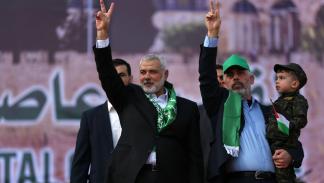 إسماعيل هنية (يسار) ويحيى السنوار في ذكرى تأسيس حماس / 14 ديسمبر 2017 (Getty)