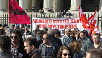 تظاهرة في باريس احتجاجاً على ترحيل مهاجرين تونسيين، مايو2011 (Getty)