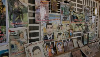 صور ضحايا جريمة سبايكر في مدينة تكريت العراقية، 20 مارس 2023 (Getty)