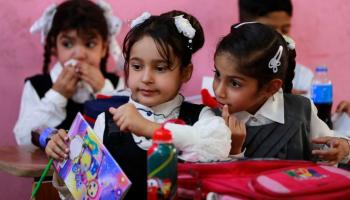 تلاميذ في أول يوم مدرسة في العراق 2023 (أحمد الربيعي/ فرانس برس)