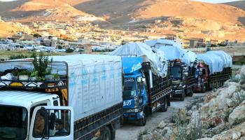 شاحنات تحمل سوريين مرحلين من لبنان، البقاع 14 مايو 2024 (فرانس برس)