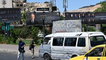 لافتات لمرشحي انتخابات مجلس الشعب السوري 14- 7- 2024 ( فرانس برس)