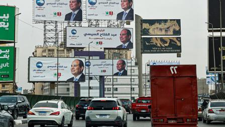 لوحات إعلانية لحملة الرئيس عبد الفتاح السيسي قبل الانتخابات الرئاسية، القاهرة 7 ديسمبر 2023 (خالد دسوقي / فرانس برس)