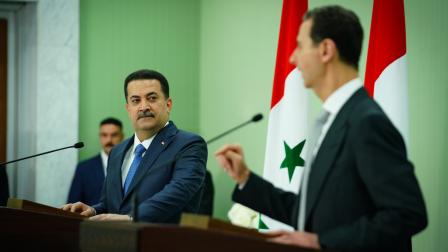 السوداني والأسد في دمشق، يوليو 2023 (Getty)