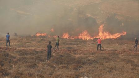 حريق اندلع في قرية بيتين برام الله عام 2021 (عصام ريماوي/ الأناضول)