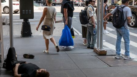 الفقر يتزايد في عاصمة المال، مانهاتن، 17 يونيو (سبنسر بلات/ Getty)
