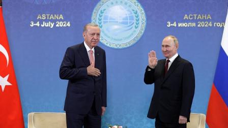 أردوغان مع بوتين على هامش قمة قادة الدول الأعضاء بمنظمة شنغهاي 3 يوليو 2024 (Getty)