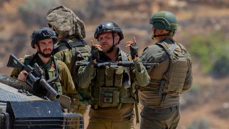 جنود إسرائيليون يتجمعون بالقرب من بلدة بيتا 2 يوليو 2024 (Getty)