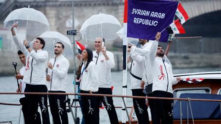 رياضيون في وفد النظام السوري خلال افتتاح أولمبياد باريس 26 يوليو 2024 (Getty)
