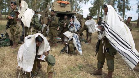جنود في وحدة نيتسح يهودا العسكرية الإسرائيلية، 19 مايو 2014 (Getty)